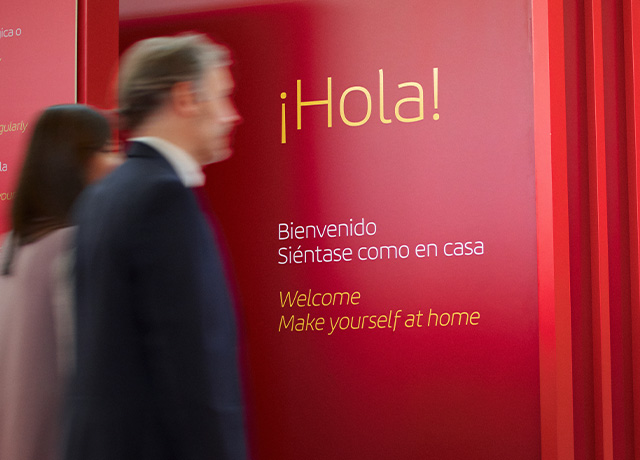  Two people entering the Iberia VIP lounge at the airport