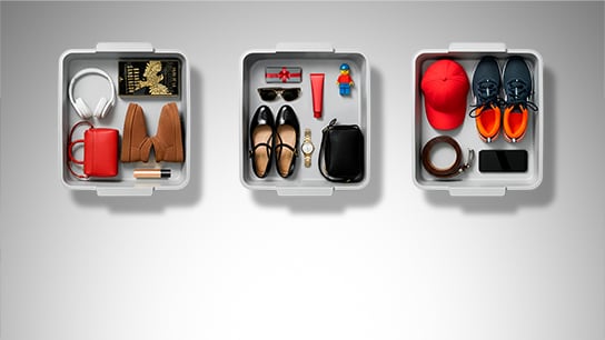 The image shows a woman holding a credit card