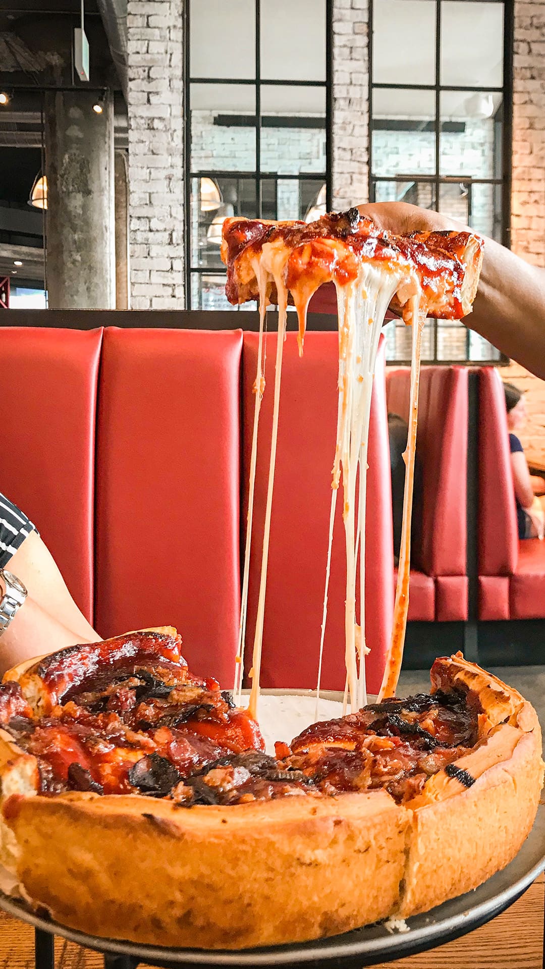 Chicago-style pizza, with a thick crust and plenty of filling