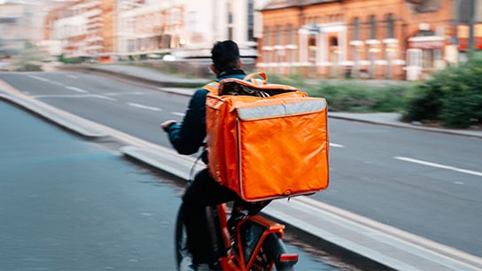 The image shows a Rappi rider