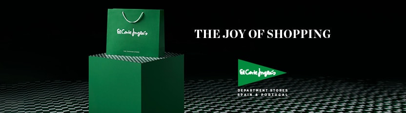 The image depicts a shopping bag emerging from a green box with the caption 